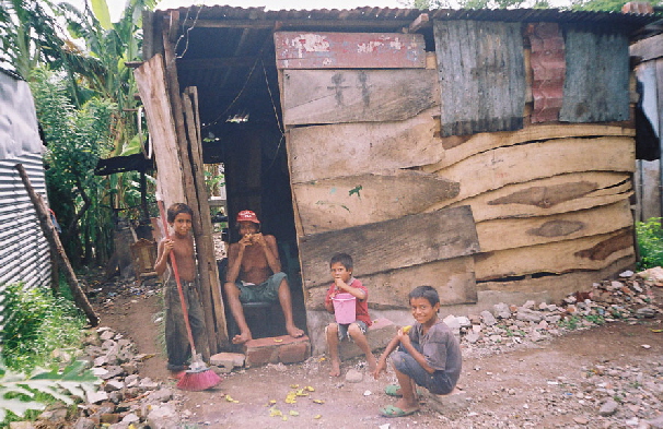 Father and 3 boys at home