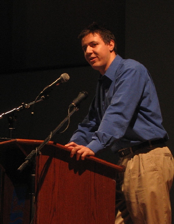 Alex speaking at a children's forum